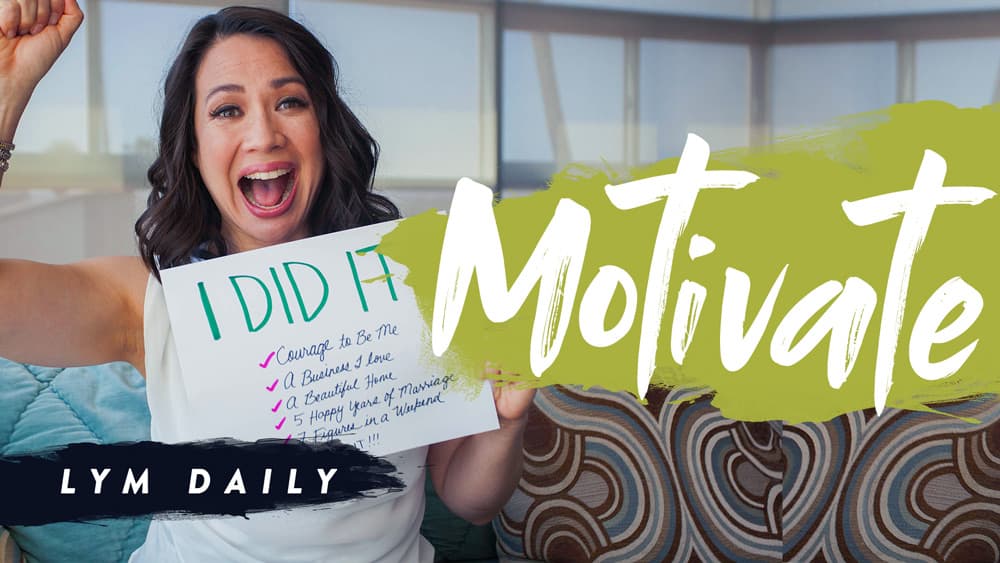 A smiling person holds a sign that says I DID IT! with a checklist underneath. The word Motivate is prominently displayed across the image. The setting appears to be a casual indoor space.