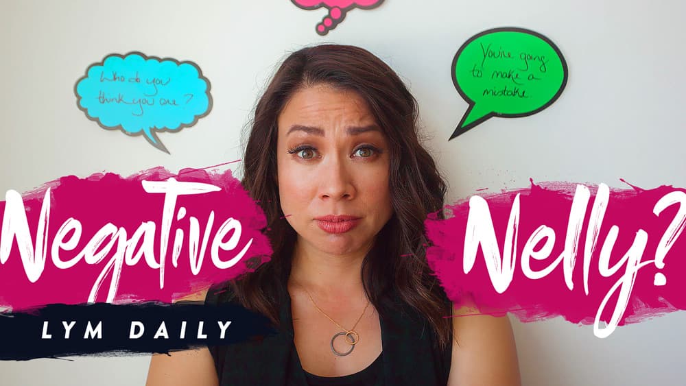 A woman looks concerned, with thought bubbles above her displaying phrases like Who do you think you are? and Youre going to make a mistake. The text Negative Nelly? and LYM DAILY appears over the image.