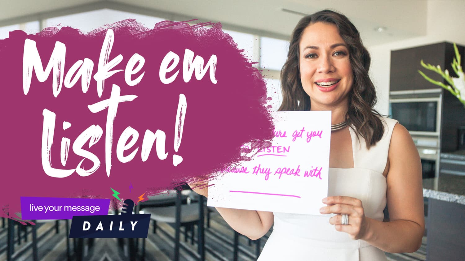 A woman in a white dress holds a sign in a modern kitchen. The text on the image reads Make em Listen! A small banner at the bottom left says live your message DAILY.
