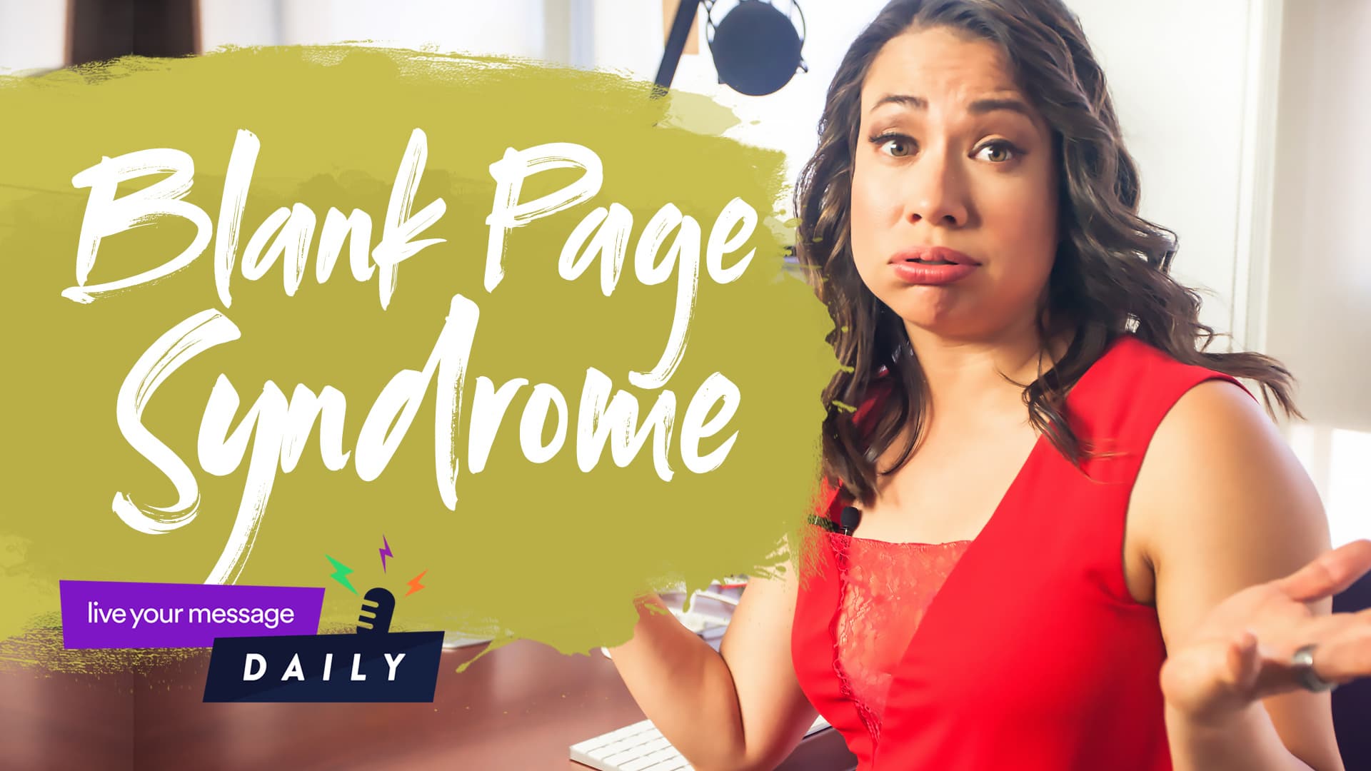 A person in a red top looks into the camera with a frustrated expression, sitting at a desk. The text reads Blank Page Syndrome. A logo in the bottom left corner says Live Your Message Daily.