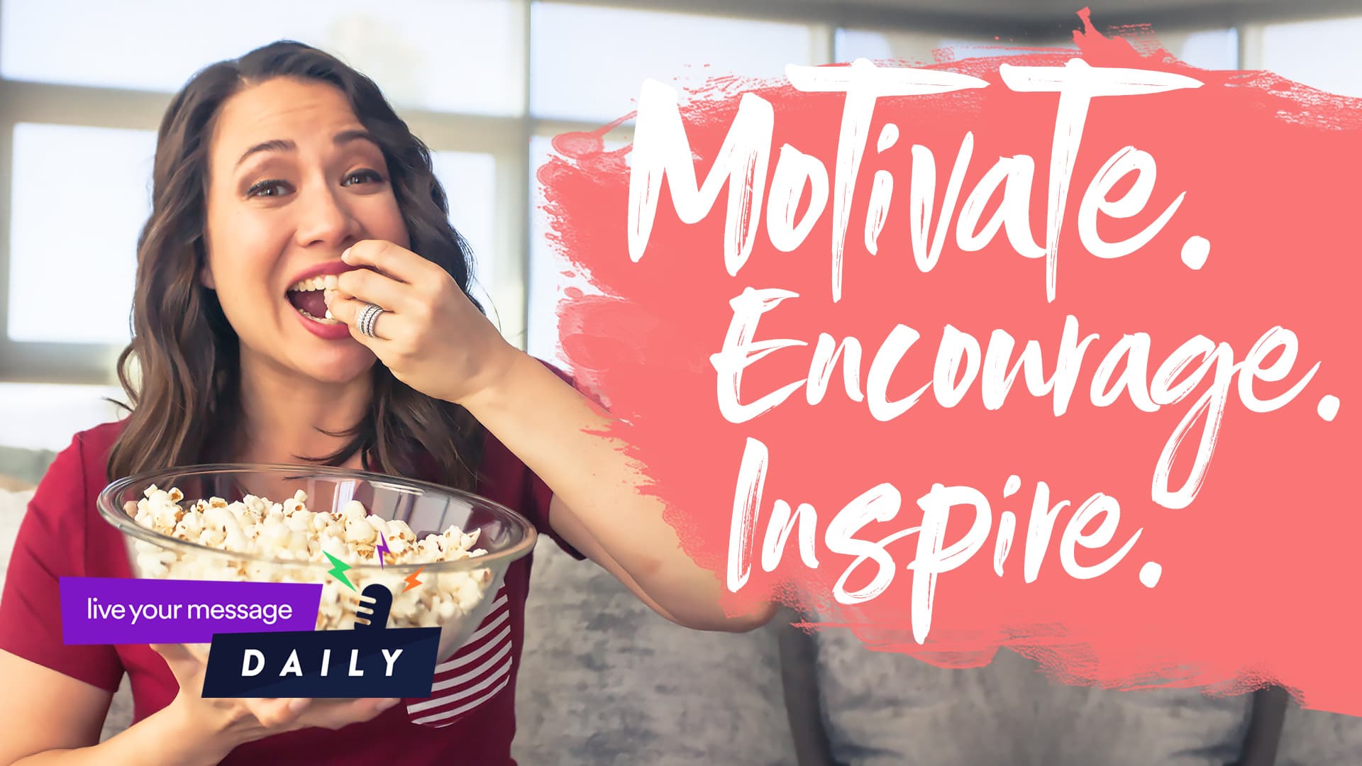 A woman sitting on a couch eating popcorn smiles at the camera. The background features a window and red paint splash with text: Motivate. Encourage. Inspire. A small logo says live your message DAILY in the corner.