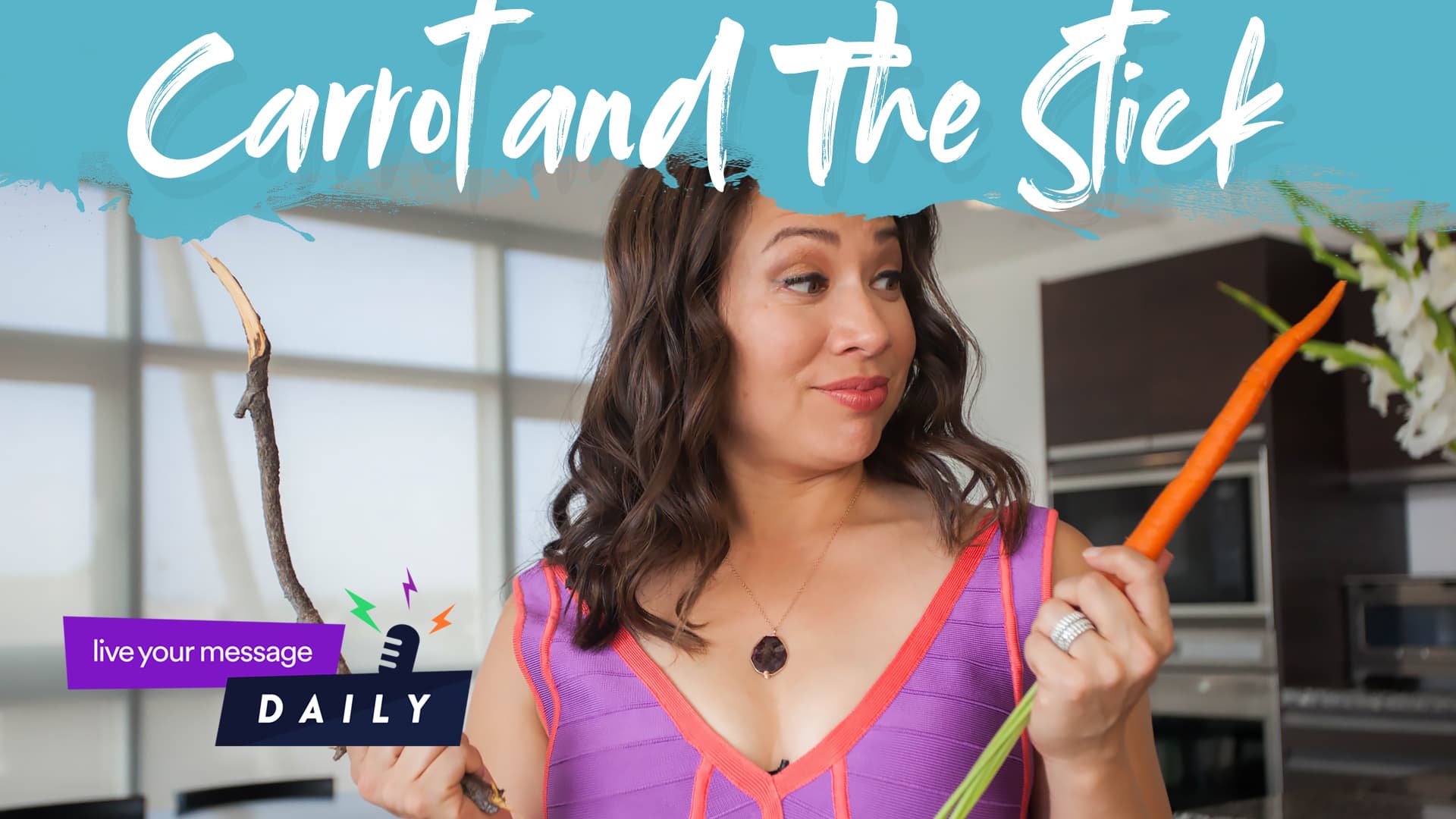 A woman in a pink dress holds a carrot in one hand and a stick in the other, smiling. Text reads Carrot and the Stick. A small graphic says live your message DAILY with a microphone icon. Background shows a bright room.