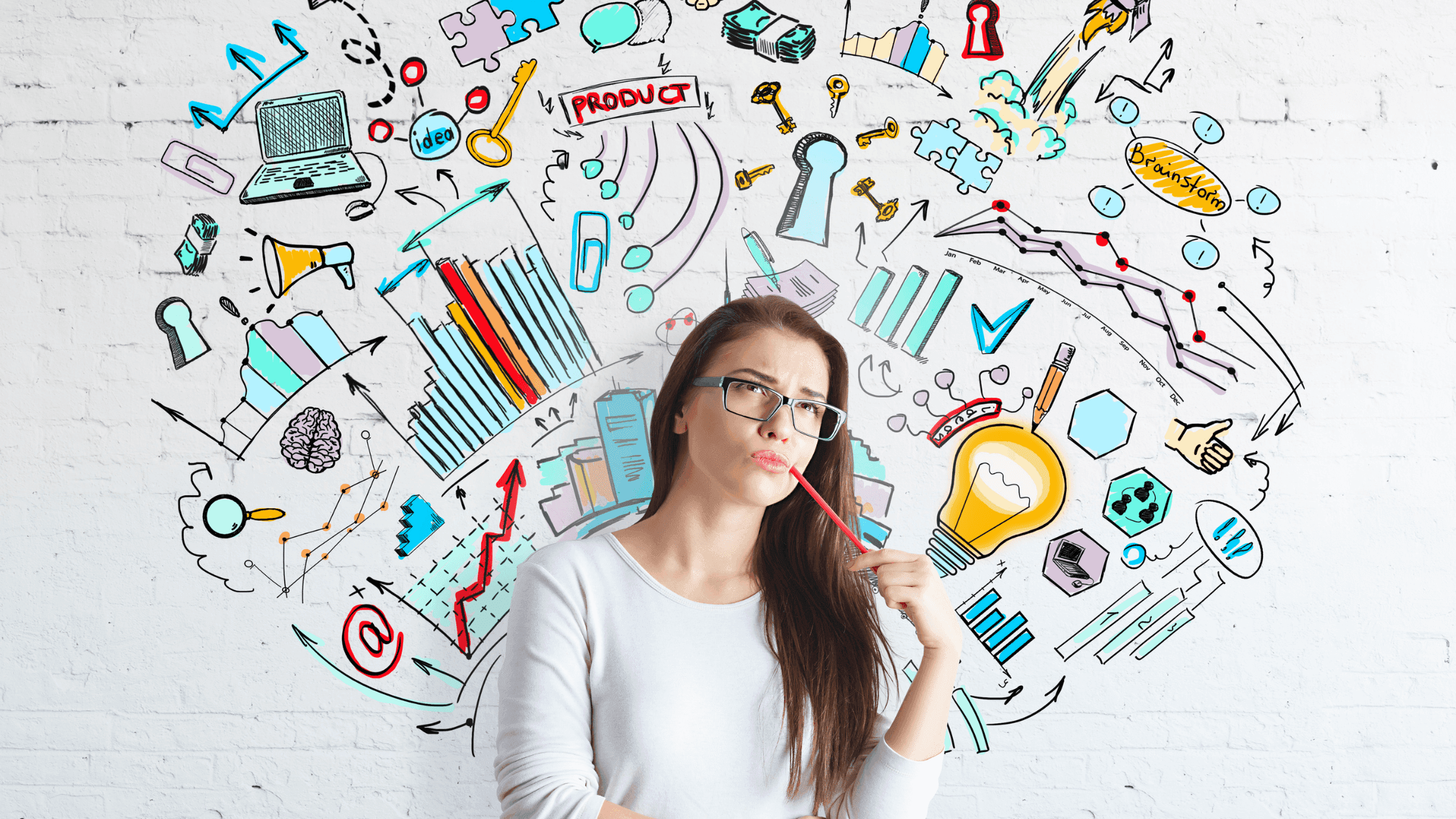 A woman in a white shirt stands pensively in front of a white brick wall covered with colorful, abstract illustrations of charts, graphs, light bulbs, gears, and various symbols representing ideas and creativity.