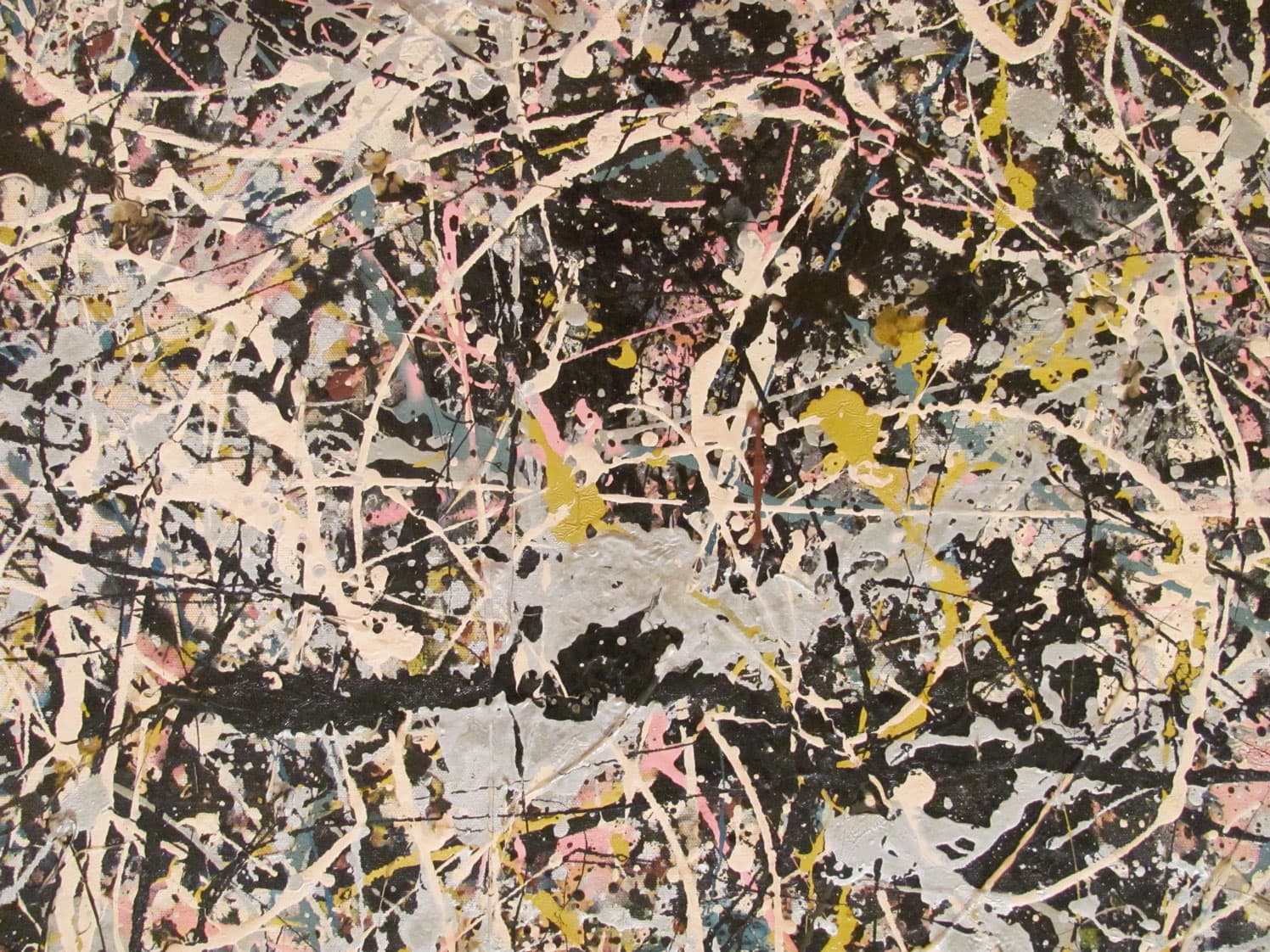 An abstract painting featuring a chaotic blend of splattered paint strokes in white, black, pink, and yellow. Lines crisscross densely over the canvas, creating a textured, energetic composition.