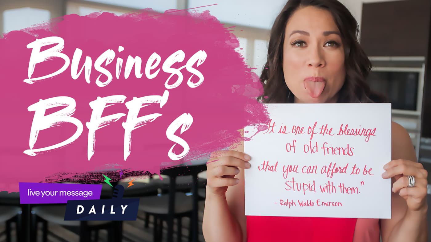 A woman playfully sticks out her tongue while holding a sign with a quote about old friends. The text reads, Business BFFs and live your message DAILY is in a badge at the bottom left.