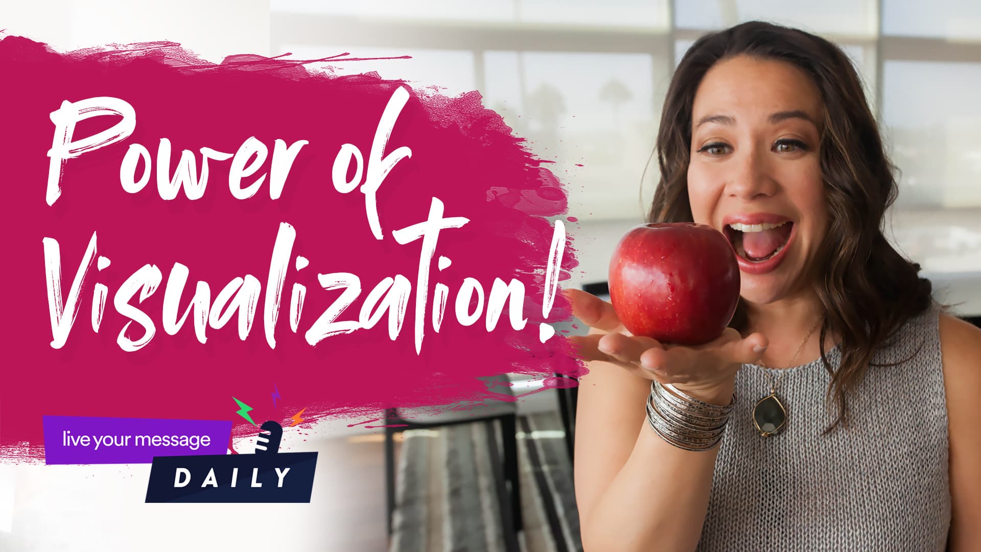 A woman holds a red apple with an excited expression. The text reads Power of Visualization! and theres a purple and white logo with the words live your message DAILY. The background is a blurred indoor setting.