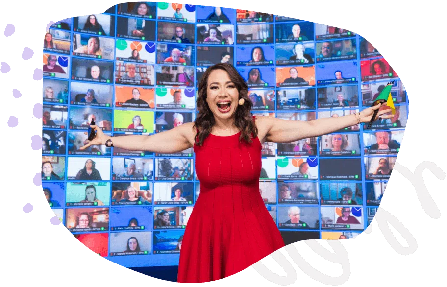 Marisa celebrates in front of a wall of video call faces